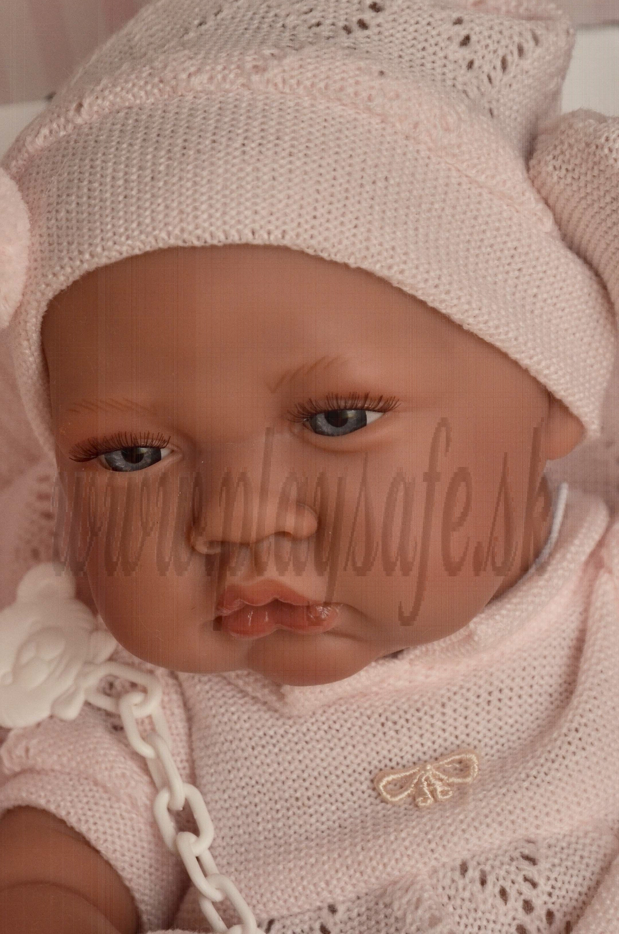 baby doll with blanket